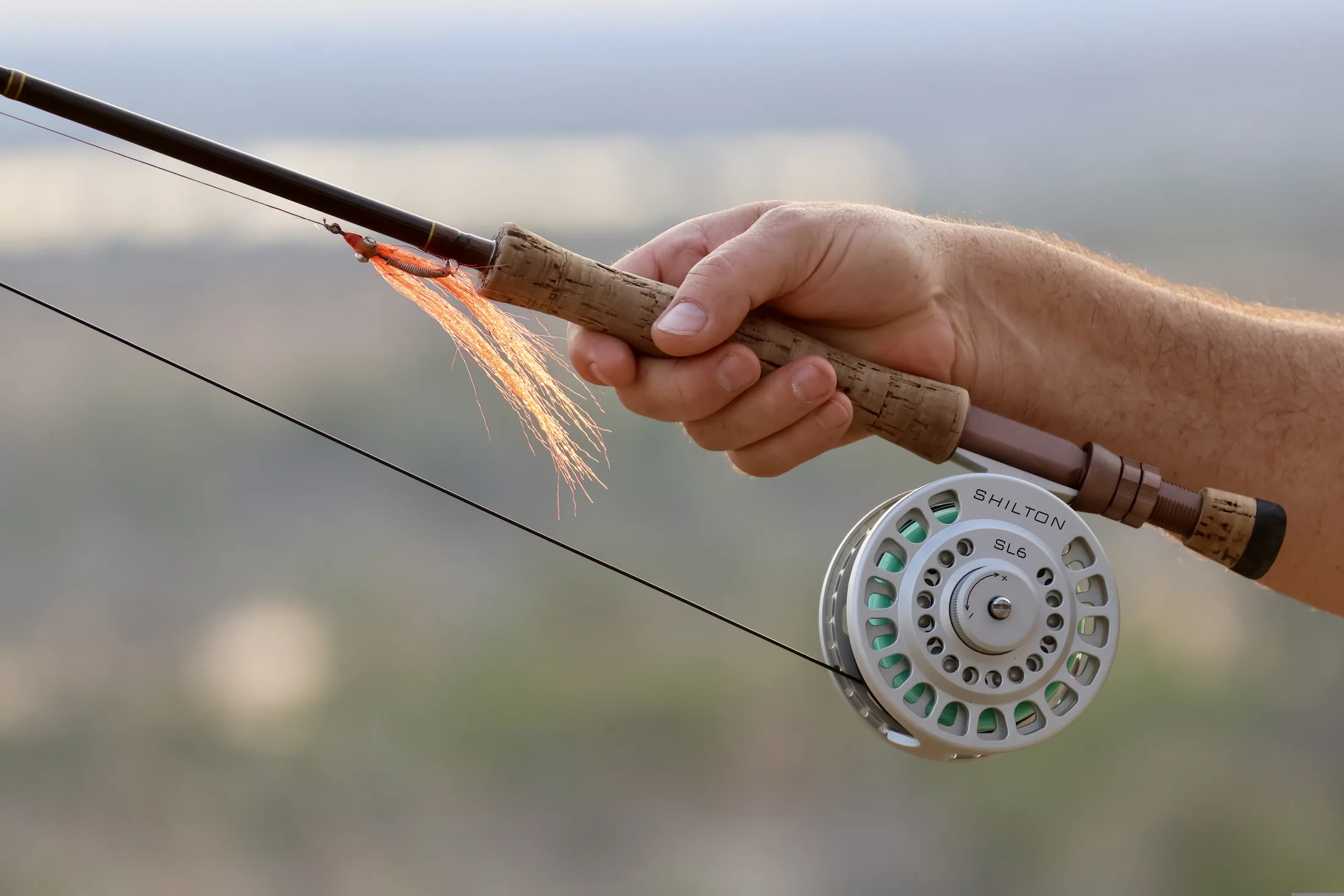 Close view of a fly rod and reel used for fishing at Shangaa